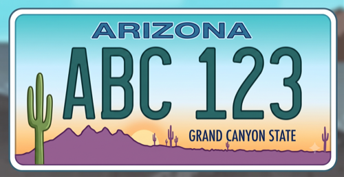 Arizona license plate: turquoise-to-orange sunset sky over purple mountains and saguaro cacti