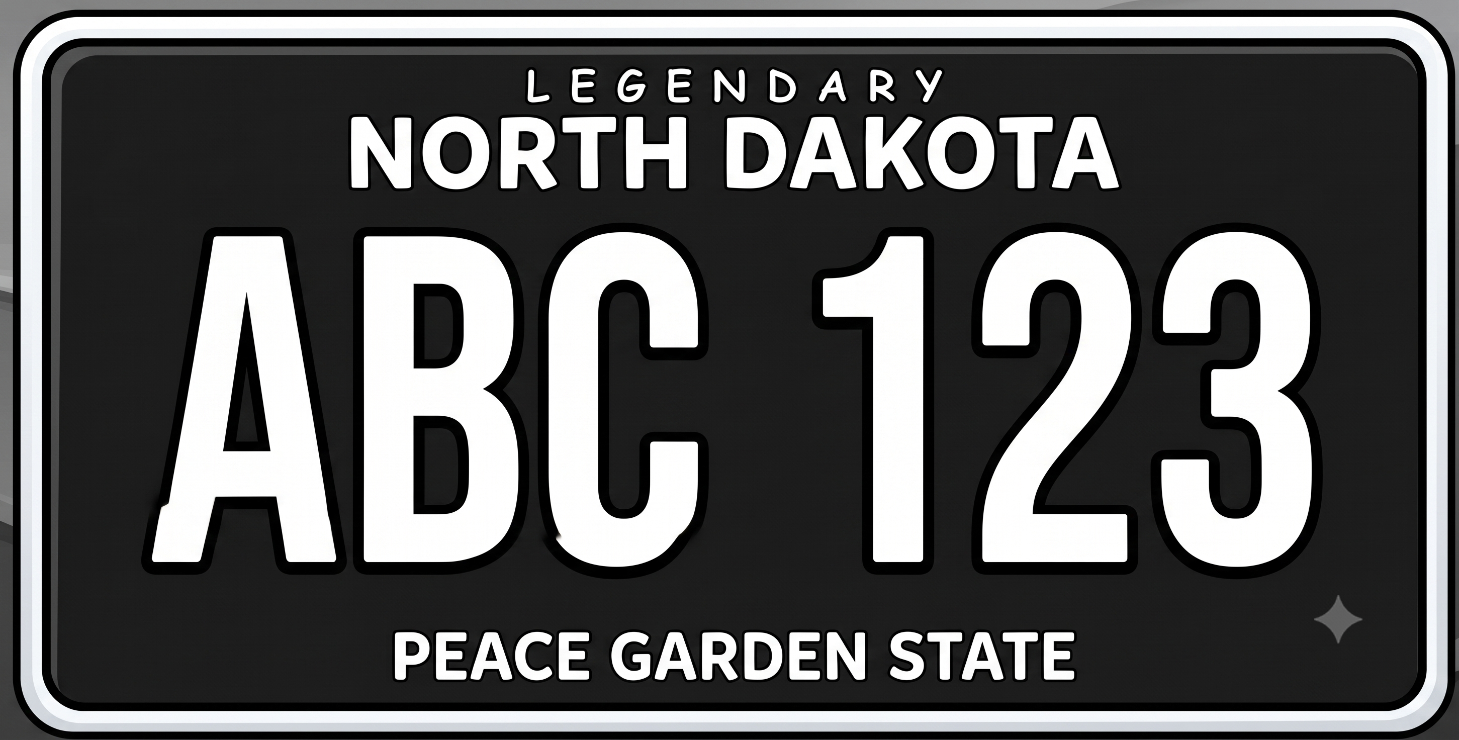 North Dakota Legendary Black license plate: solid black background, Legendary in small spaced white letters at the top, North Dakota in large bold white text below, ABC 123 in very large white characters with black outlines across the center, Peace Garden State in white at the bottom, and a small four-pointed star diamond in the lower right corner